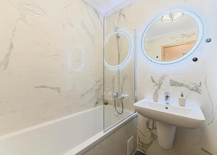 Апартаменти Mohost Blue Moon *